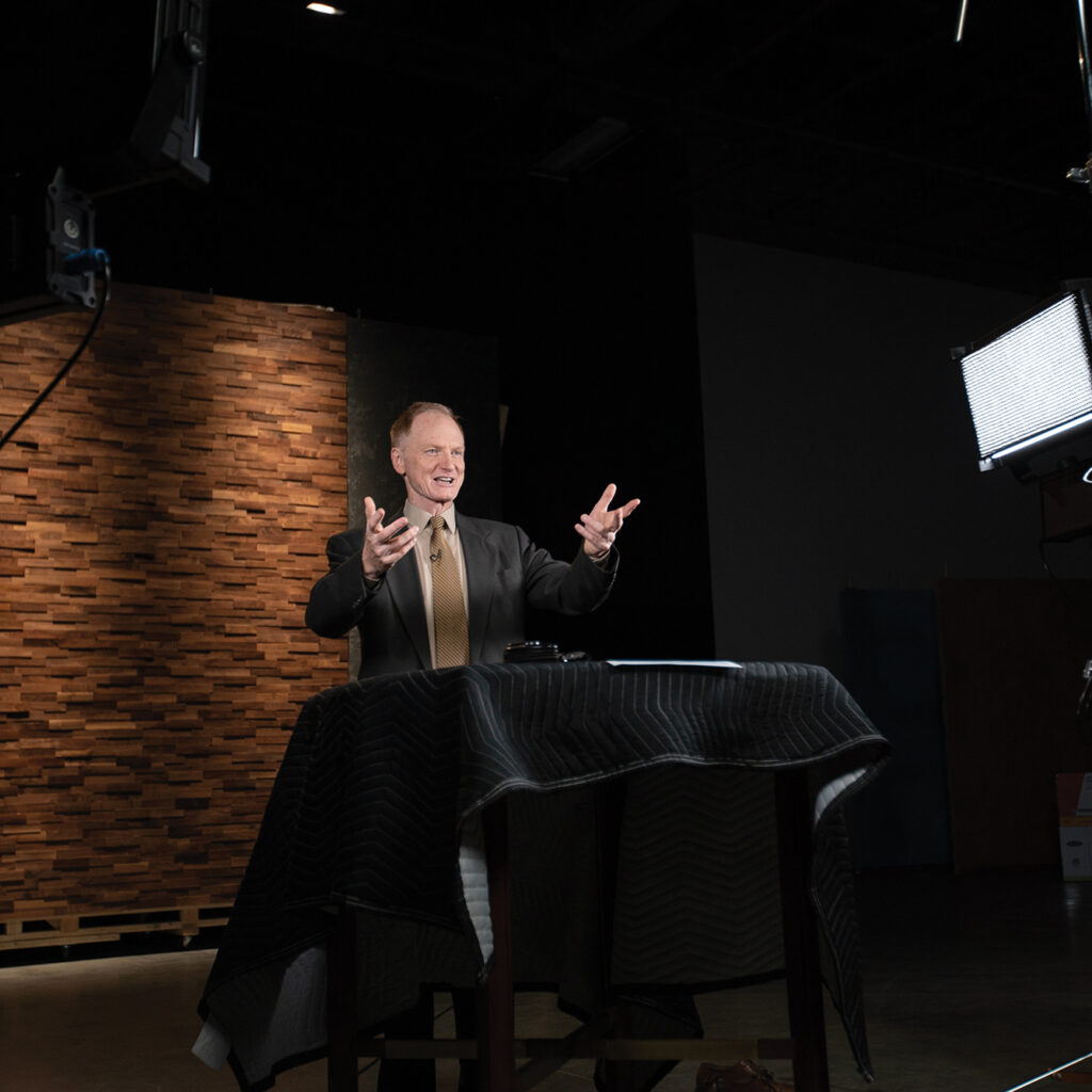 John Bradshaw filming on set in the studio